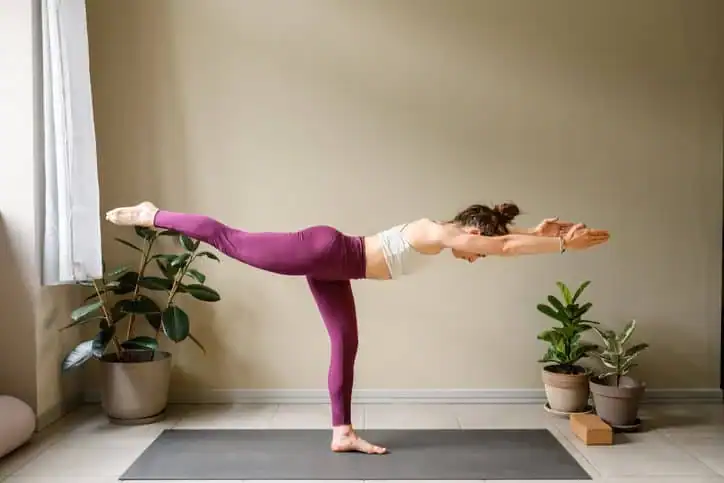 Achieving the Perfect Tone: How Often Should You Exercise for Results? 1 Woman doing Yoga exercise Weymouth to help with toning the body.