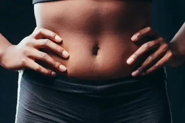 Toning Your Stomach: The Ultimate Guide to Achieving a Sculpted Stomach While Shedding Pounds 1 Image of a toned stomach after non surgical treatment Weymouth
